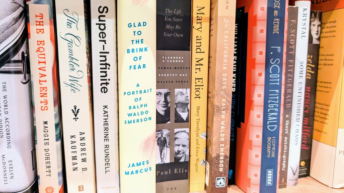 A shelf of various author biographies
